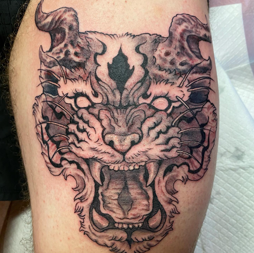 Explore hunting sleeve tattoo ideas, creative tattoo ideas in Lake George, available at Yonkers North Tattoos