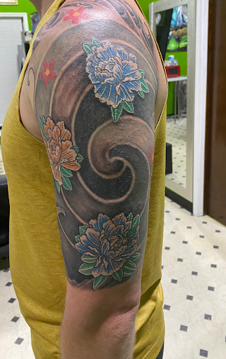 Explore chest and arm tattoo ideas, creative tattoo ideas in Evansville, available at Ink Therapy 101