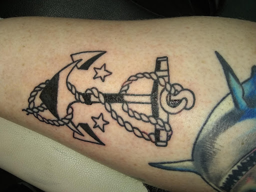 Explore foo fighters tattoo ideas, creative tattoo ideas in Burlington, available at Mr Tattoos & Piercing