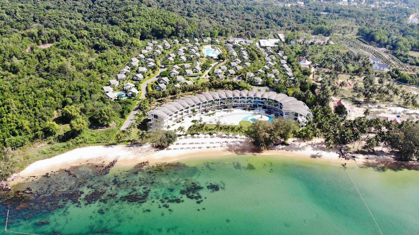 Photo of Shells resort beach and the settlement
