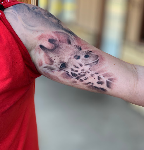 Explore half sleeve flower tattoo ideas, creative tattoo ideas in Roscoe, available at Elevated Ink Tattoo