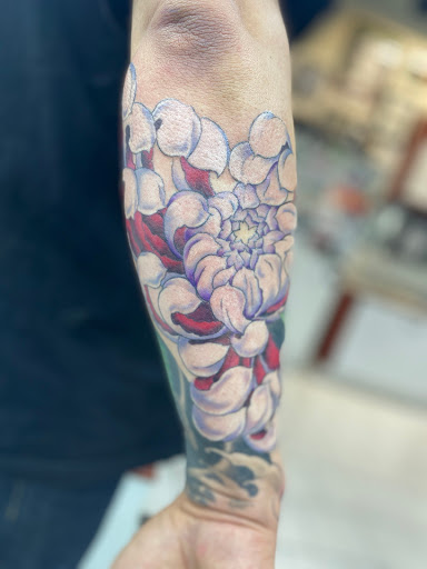 Explore butterfly leg tattoo ideas, creative tattoo ideas in Sparks, available at Tidal Wave Tattoo