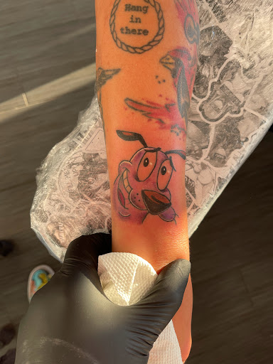 Explore matching tattoo ideas for husband and wife, creative tattoo ideas in Palm Harbor, available at Angry Owl Tattoo and Piercing