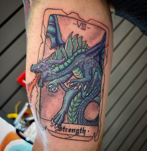 Explore red ink tattoo ideas, creative tattoo ideas in Davenport, available at Eclipse Tattoos