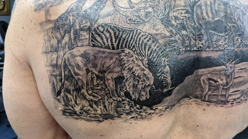 Explore twd tattoo ideas, creative tattoo ideas in Glendale, available at Bad Intentions Tattoo, Piercing & Supply, LLC