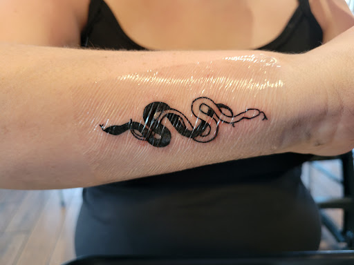 Find tattoo ideas for a mom for your next unique tattoo in Warner Robins at Untold Pain Tattoo Studio