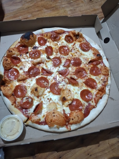 Quecho pizza a la leña
