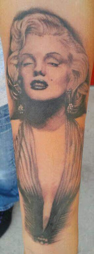 Tattoo Shop «Grapes Designs», reviews and photos, 103 S 3rd St, Scottsville, KY 42164, USA