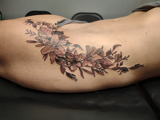 Explore stillborn tattoo ideas, creative tattoo ideas in Williamston, available at Inkd Tattoo Parlor