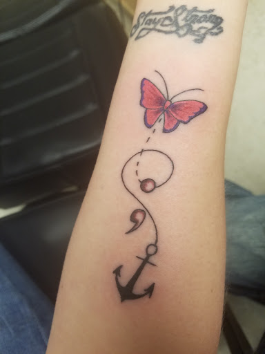 Explore women tattoo sleeve ideas, creative tattoo ideas in Winona, available at Red Wing Tattoo