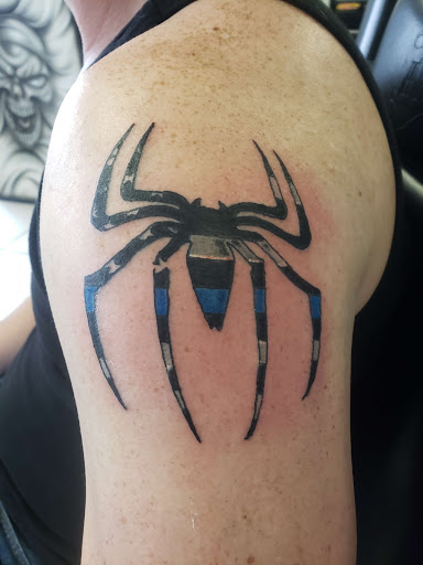 Explore tattoo ideas for pets, creative tattoo ideas in Hudson, available at Inkredible Inc Tattoos