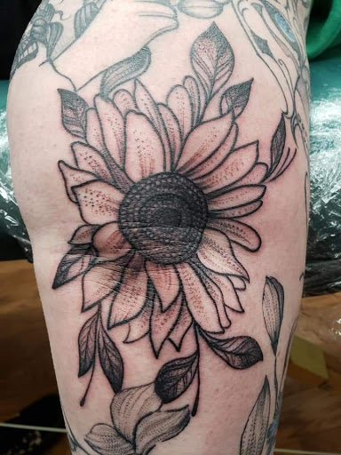 Explore paw print tattoo ideas, creative tattoo ideas in Shelbyville, available at Stage Left Tattoo and Piercing