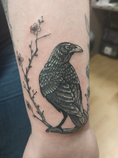 Explore curly hair tattoo ideas, creative tattoo ideas in Peckville, available at The Chaotic Cauldron Tattoos and More