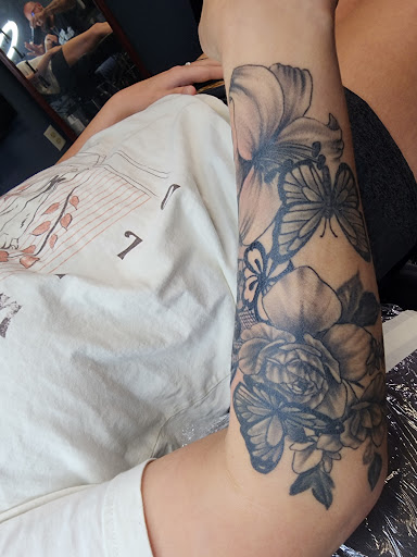 Explore religious tattoo ideas, creative tattoo ideas in Yankton, available at Exquisite Ink