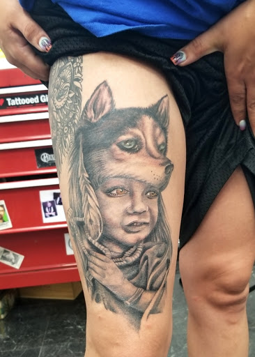 Explore thigh tattoo ideas for men, creative tattoo ideas in Hawthorne, available at Artistic Vision Ink Tattoo And Body Piercing