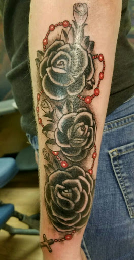 Explore cute cover up tattoo ideas, creative tattoo ideas in Chicago, available at Top Hat Tattoo