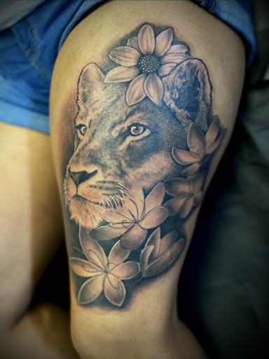 Find angel tattoo ideas for men for your next unique tattoo in Lafayette at Blasted Tattoos