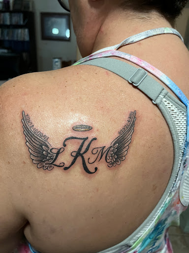 Explore two face tattoo ideas, creative tattoo ideas in Ocoee, available at Slaughterized Ink Tattoo and Piercing Studio