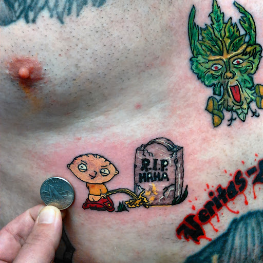 Explore mens behind the ear tattoo ideas, creative tattoo ideas in Hudson Falls, available at ALTERED ADDICTION TATTOOS