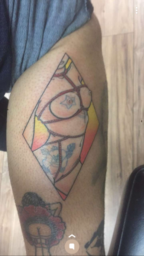 Explore tramp stamp tattoo cover up ideas, creative tattoo ideas in Tacoma, available at Rolling Gypsy Tattoo