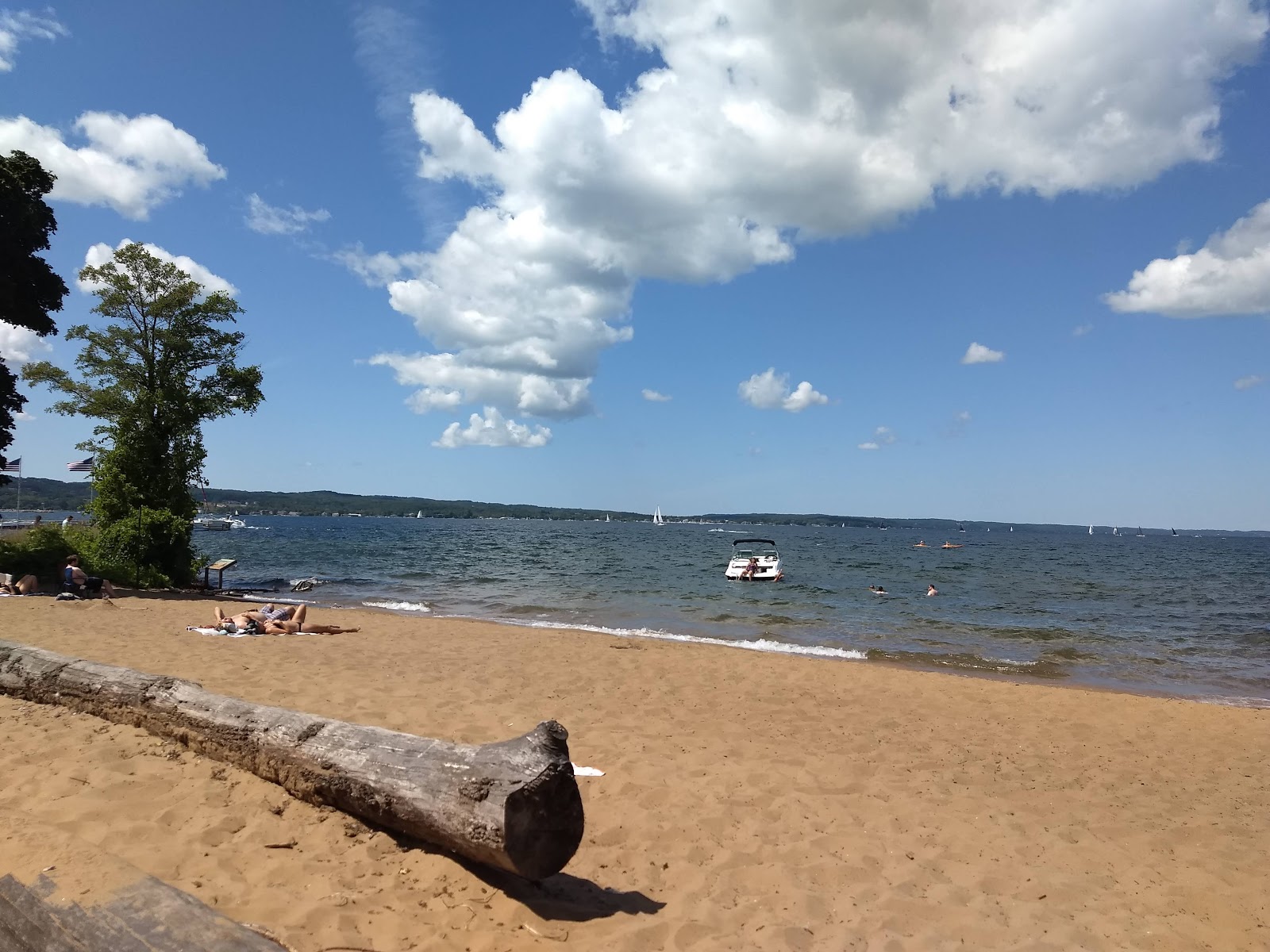 Foto von Sunset Park Beach mit beiger sand Oberfläche