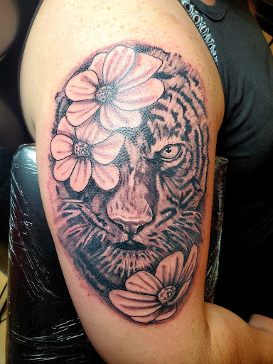 Explore foreign language tattoo ideas, creative tattoo ideas in East Providence, available at Ink Therapy