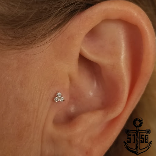 Explore mens shin tattoo ideas, creative tattoo ideas in Kearney, available at Studio 5150 Piercing & Fine Jewelry