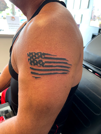 Explore small face tattoo ideas, creative tattoo ideas in Palm Harbor, available at Angry Owl Tattoo and Piercing