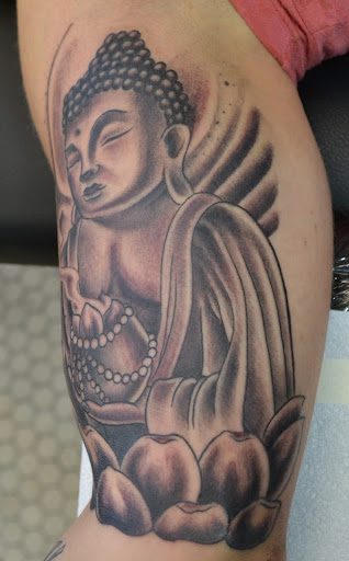 Explore behind ear tattoo ideas for guys, creative tattoo ideas in Little Falls, available at Elliotts Tattoo