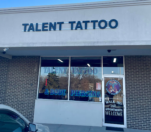 Find cardinal tattoo ideas for ladies for your next unique tattoo in Overland Park at Talent Tattoo And Body Piercing
