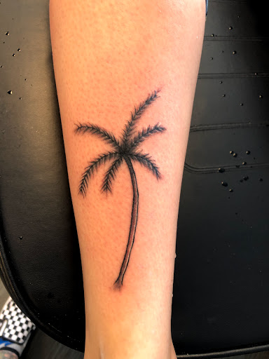 Explore mgk tattoo ideas, creative tattoo ideas in Palm Harbor, available at Angry Owl Tattoo and Piercing