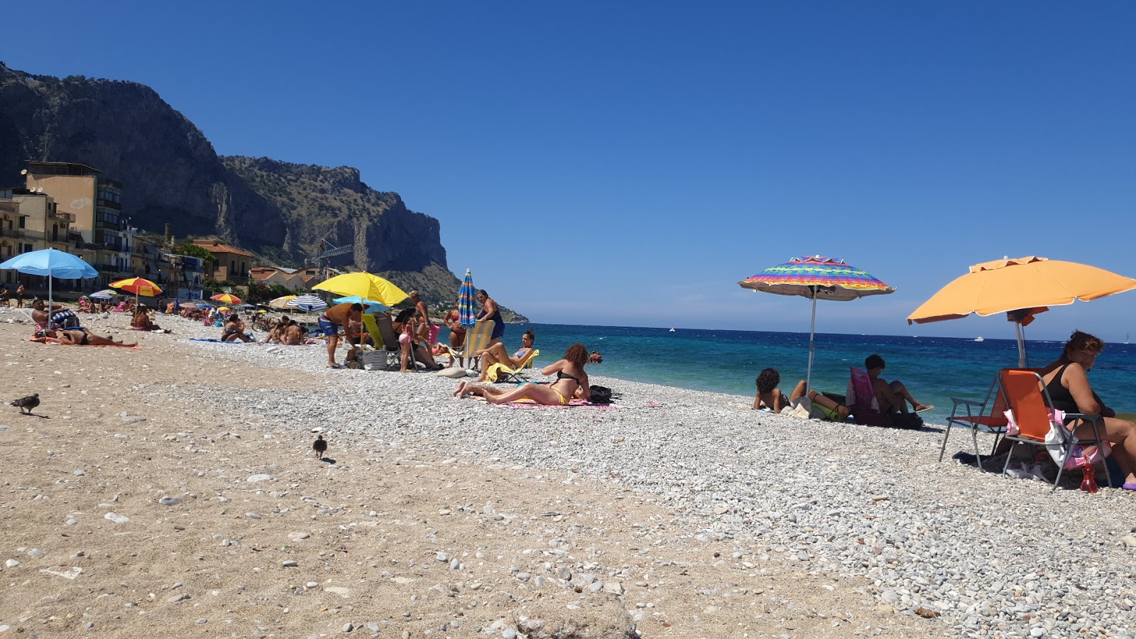 Foto av Arenella beach med turkos rent vatten yta