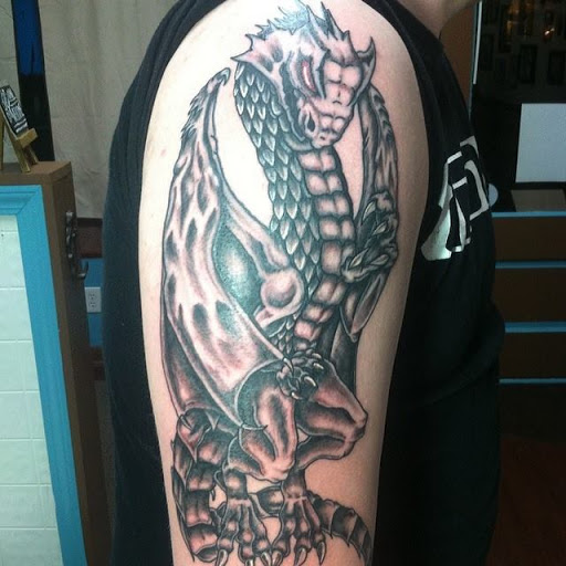 Explore sink or swim tattoo ideas, creative tattoo ideas in Radcliff, available at Iron Orchid Tattoo Radcliff