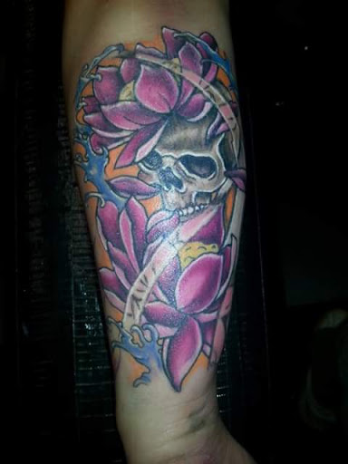 Explore silver line tattoo ideas, creative tattoo ideas in Anniston, available at Wicked Game Tattoo & Piercing Studio