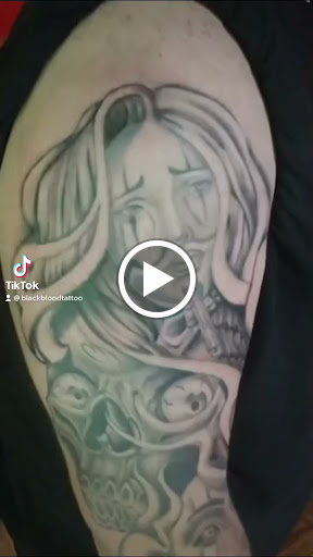 Explore blackwork tattoo ideas, creative tattoo ideas in Lander, available at Blackblood Tattoo and Piercing