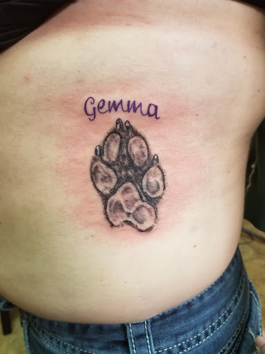 Explore lion cub tattoo ideas, creative tattoo ideas in Conway, available at Primal Urge Tattoos