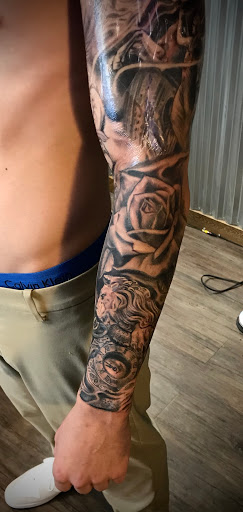 Explore flower tattoo cover up ideas, creative tattoo ideas in Murrieta, available at CON INK TATTOOS LLC