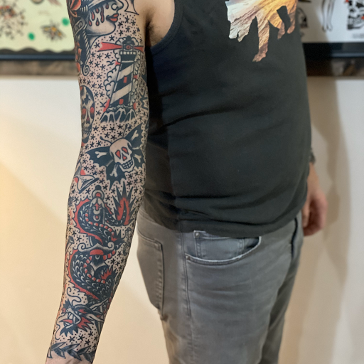 Explore feminine shoulder tattoo ideas, creative tattoo ideas in Knoxville, available at Riverside Tattoo Co.