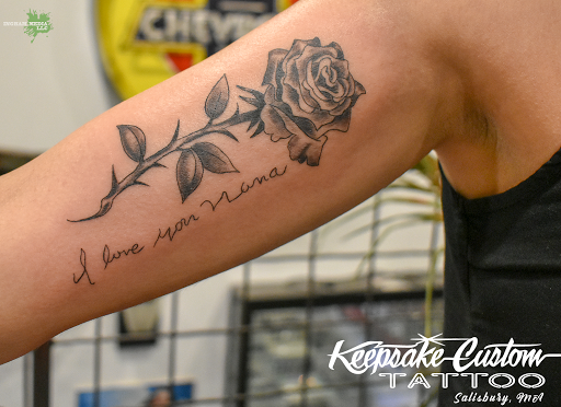 Explore mother and child tattoo ideas, creative tattoo ideas in Salisbury, available at Keepsake Custom Tattoo & Body Piercing Laser Tattoo Removal