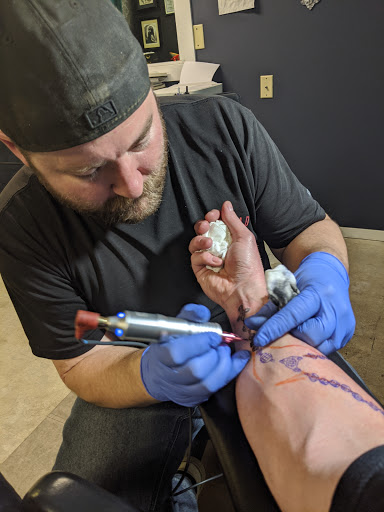 Explore cover up tattoo ideas for leg, creative tattoo ideas in Sioux Falls, available at Underground Art Studio