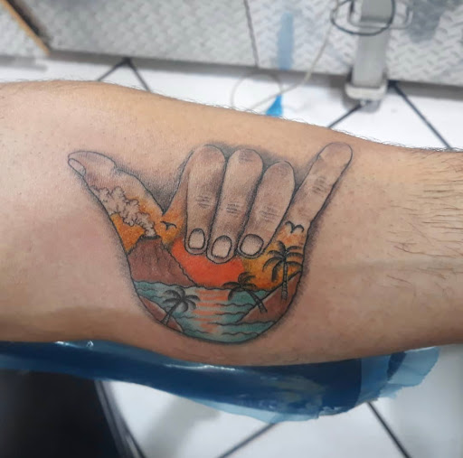 Explore fishnet tattoo ideas, creative tattoo ideas in Miami, available at Tattoos by Lou Miami - North Miami