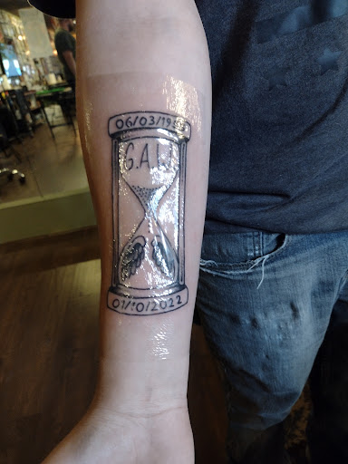 Find underboob tattoo ideas for your next unique tattoo in Johnson City at Gold Cross Tattoo Co.