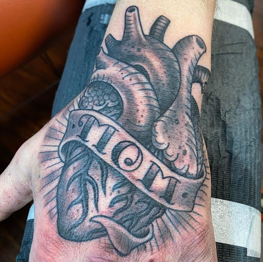 Explore rib tattoo ideas men, creative tattoo ideas in Whitefish, available at Cutthroat Tattoo