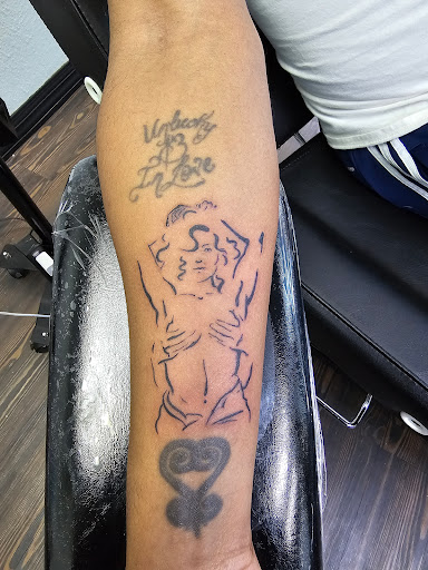 Explore ideas for hand tattoos, creative tattoo ideas in Mckinney, available at Borrowed Time Fine Art Gallery Tattoo Shop