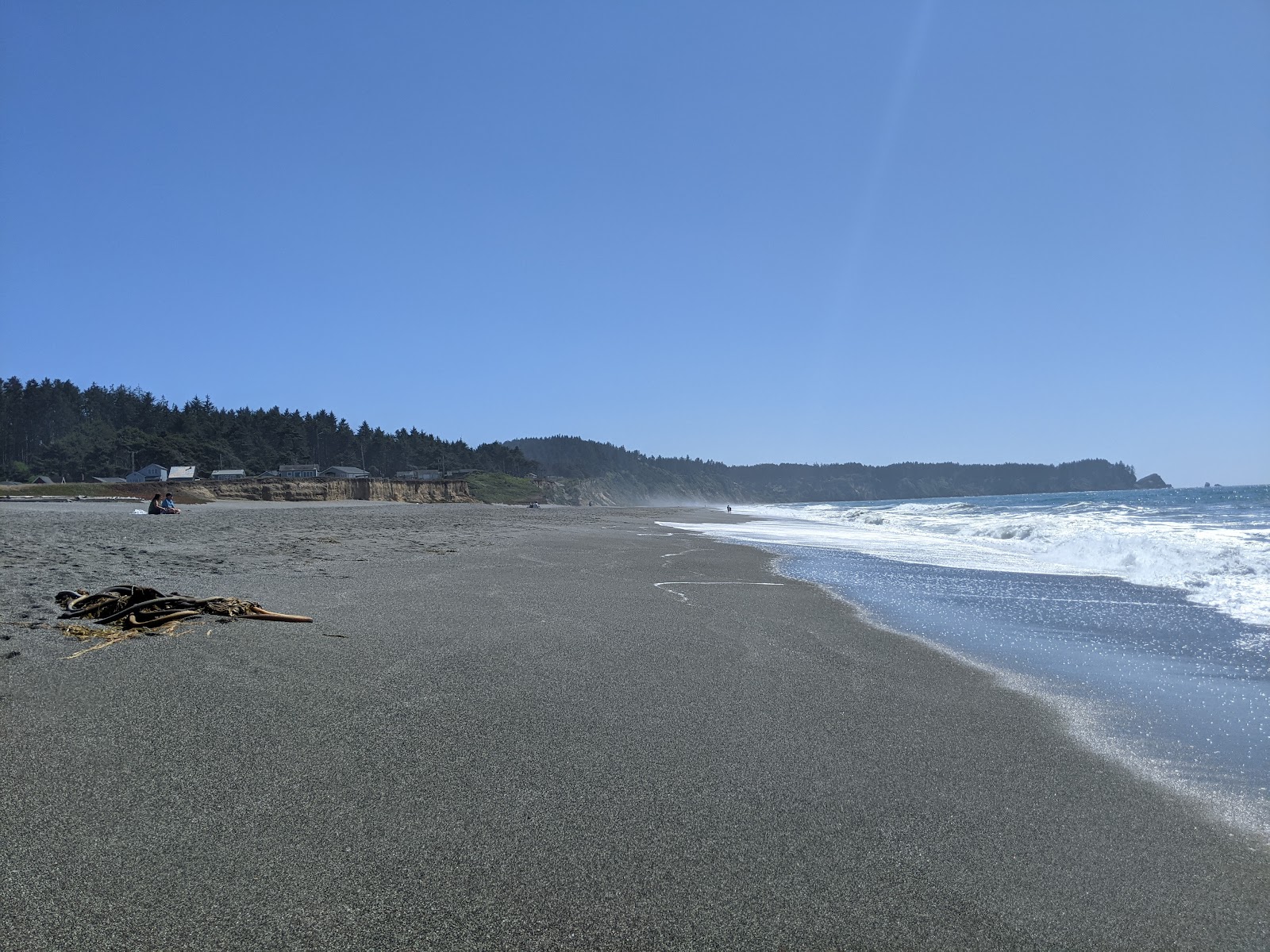 Foto di Big Lagoon Beach con una superficie del sabbia beige