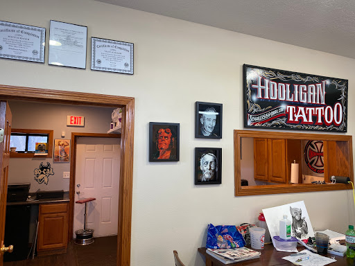 Explore meaningful elegant spine tattoo ideas, creative tattoo ideas in Des Moines, available at Hooligan Tattoo