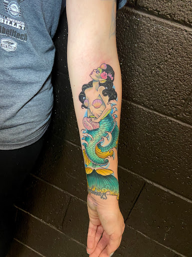 Explore letter r tattoo ideas, creative tattoo ideas in Mesa, available at Next Wave Tattoos and Piercings 2