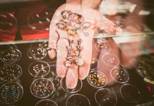 Explore tattoo ideas for lower abdomen, creative tattoo ideas in Green Bay, available at Colourbox Body Piercing Llc