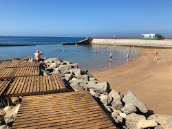 Foto von Playa Costa Alegre und die siedlung