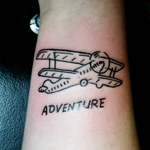 Explore feminine cover up tattoo ideas, creative tattoo ideas in Erie, available at EliKingInk